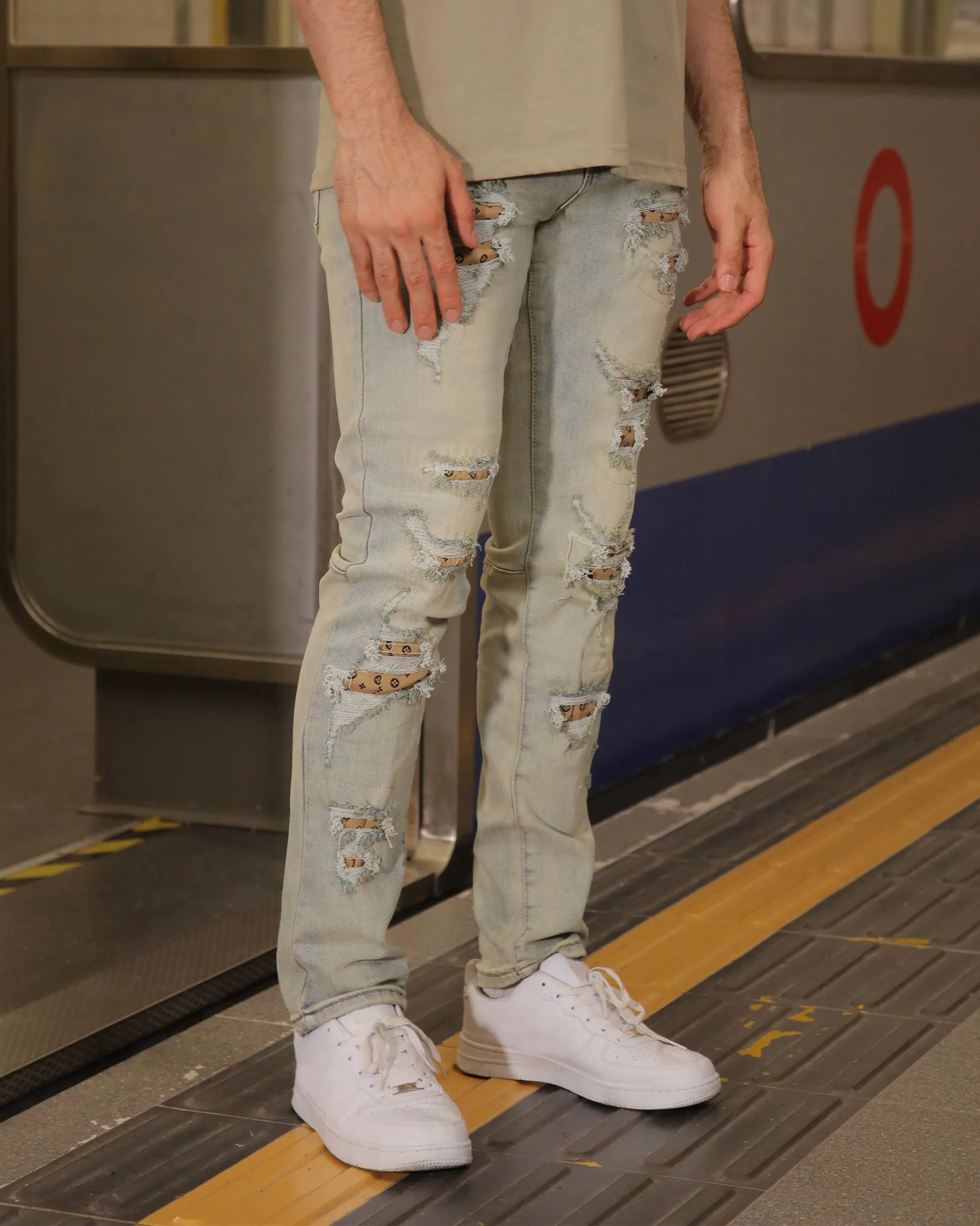 Distressed Ripped Blue Jeans with Vintage Charm