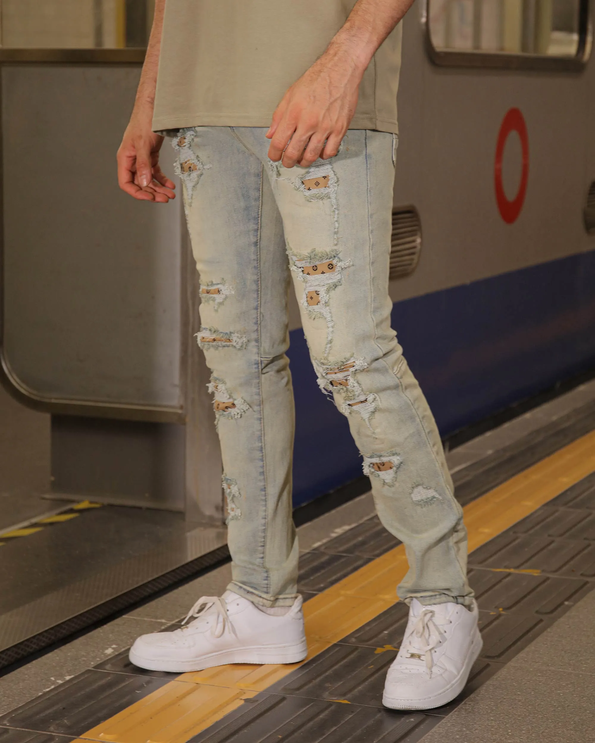 Distressed Ripped Blue Jeans with Vintage Charm