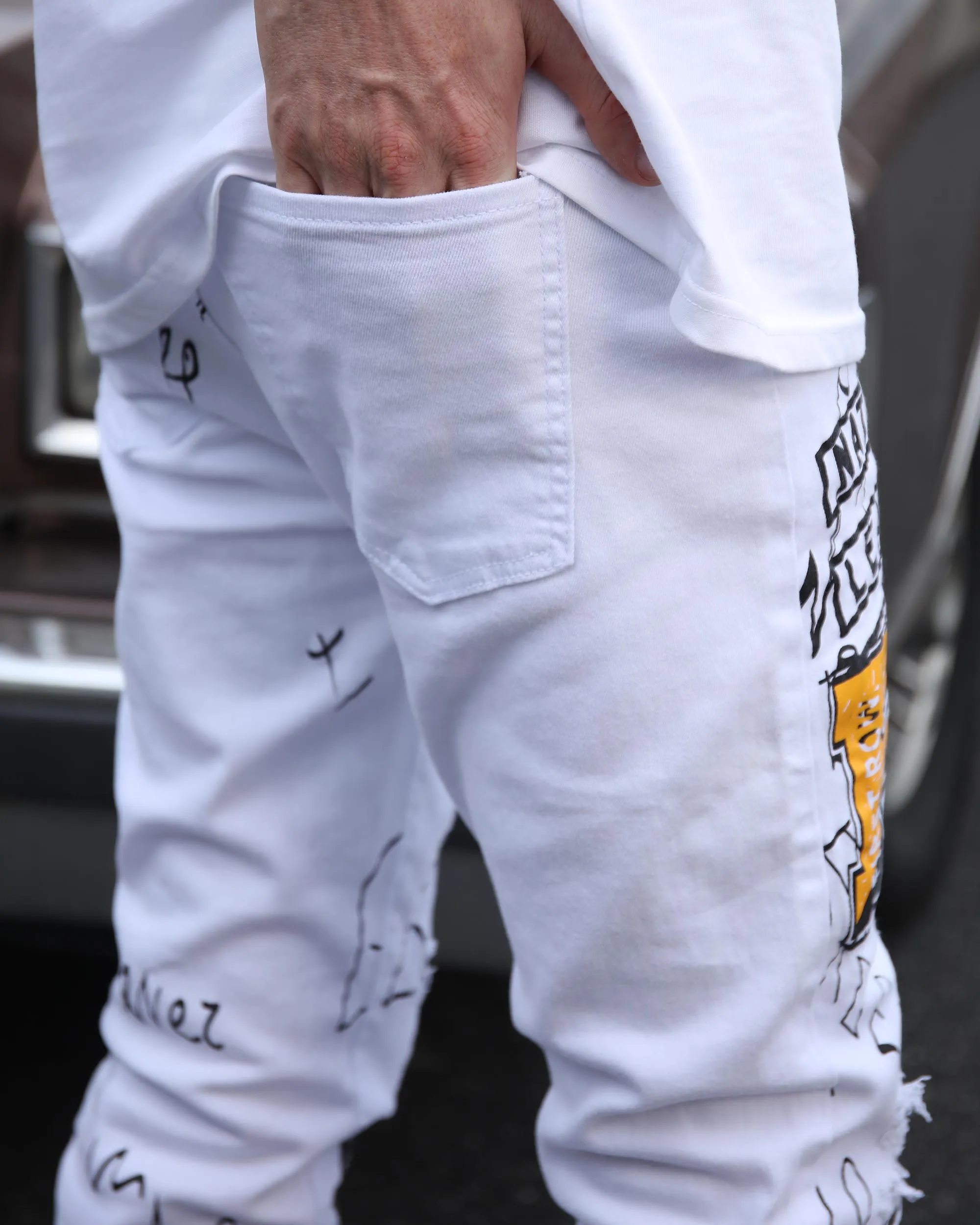 White Ripped Jeans with Colorful Graffiti and Embroidery