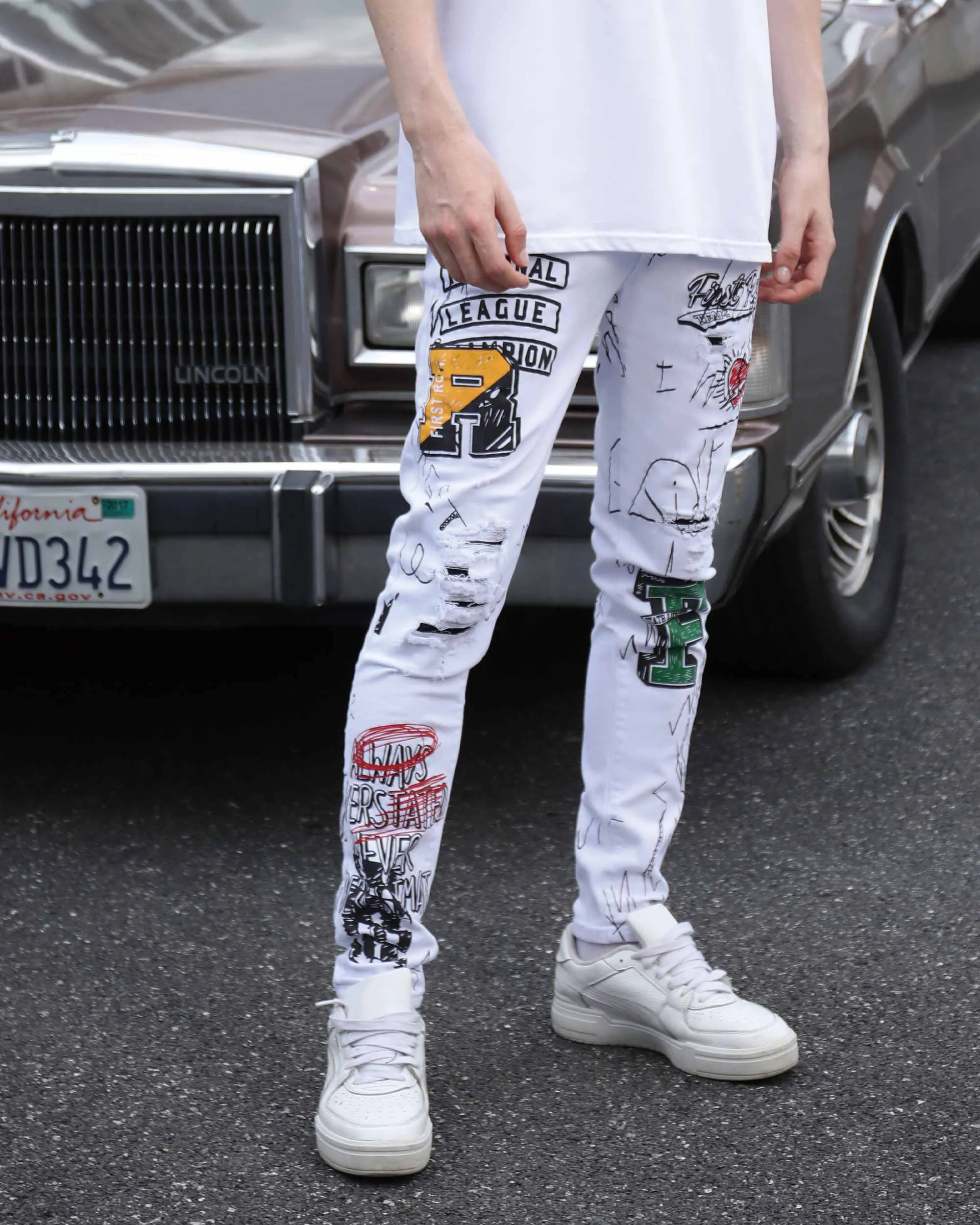 White Ripped Jeans with Colorful Graffiti and Embroidery